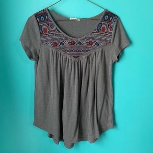 Gray shirt with detailed neckline